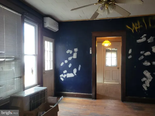 a view of an entryway with a chandelier