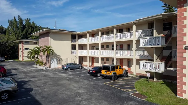 a view of a street with cars