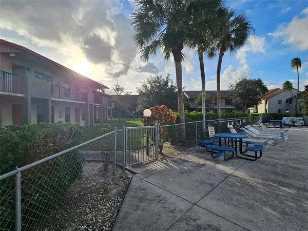 a view of a terrace with sitting area