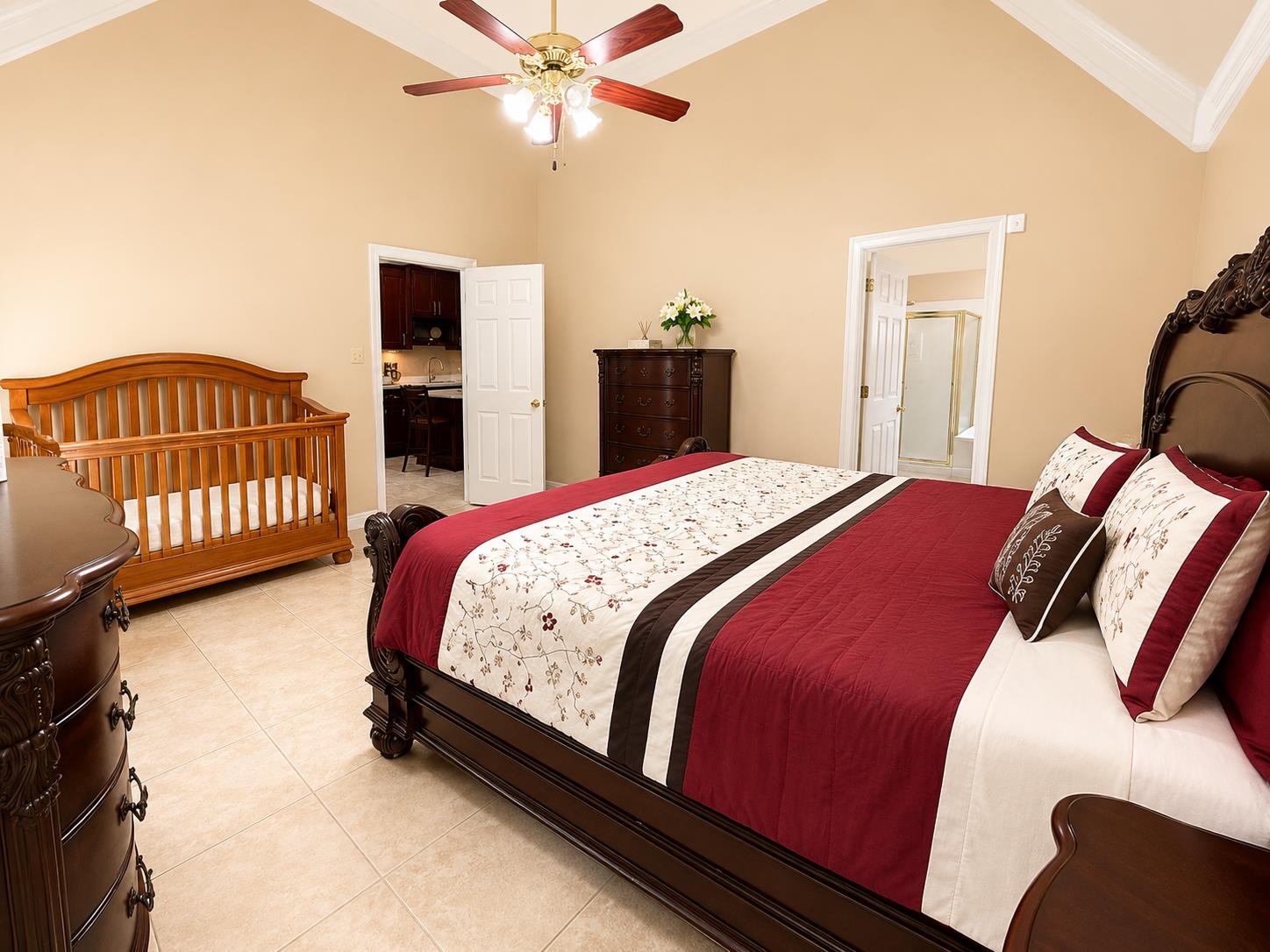 326 South Sanga Road Cordova, TN 38018 - Photo 24 of 32 Spacious room with a vaulted ceiling, crown molding, and a ceiling fan with integrated lighting