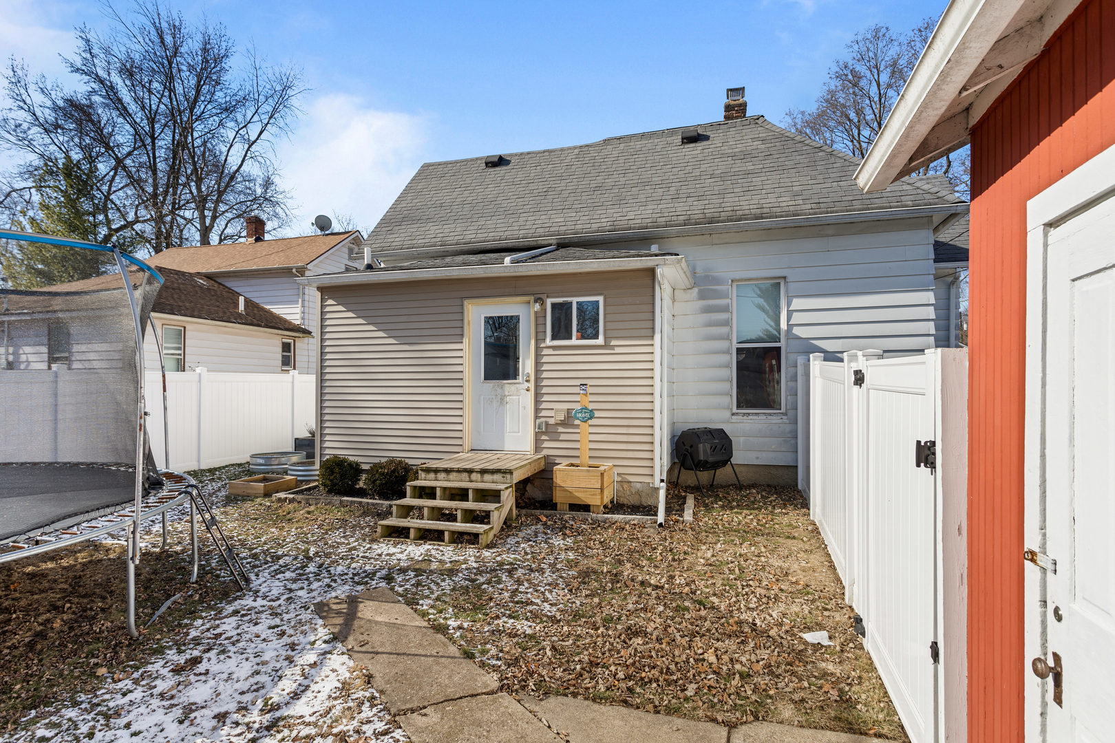 457 South Independence Street Monticello, IL 61856 - Photo 27 of 33 a backyard of a house with yard and outdoor seating