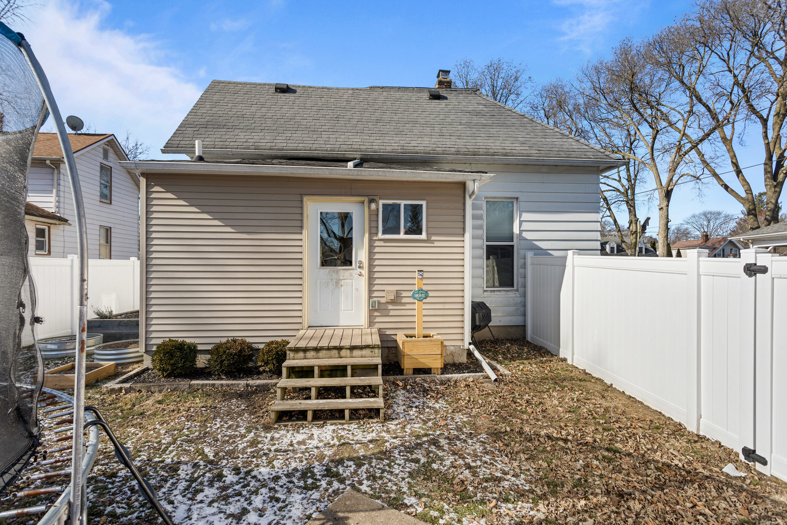 457 South Independence Street Monticello, IL 61856 - Photo 28 of 33 a view of a house with a yard and wooden fence