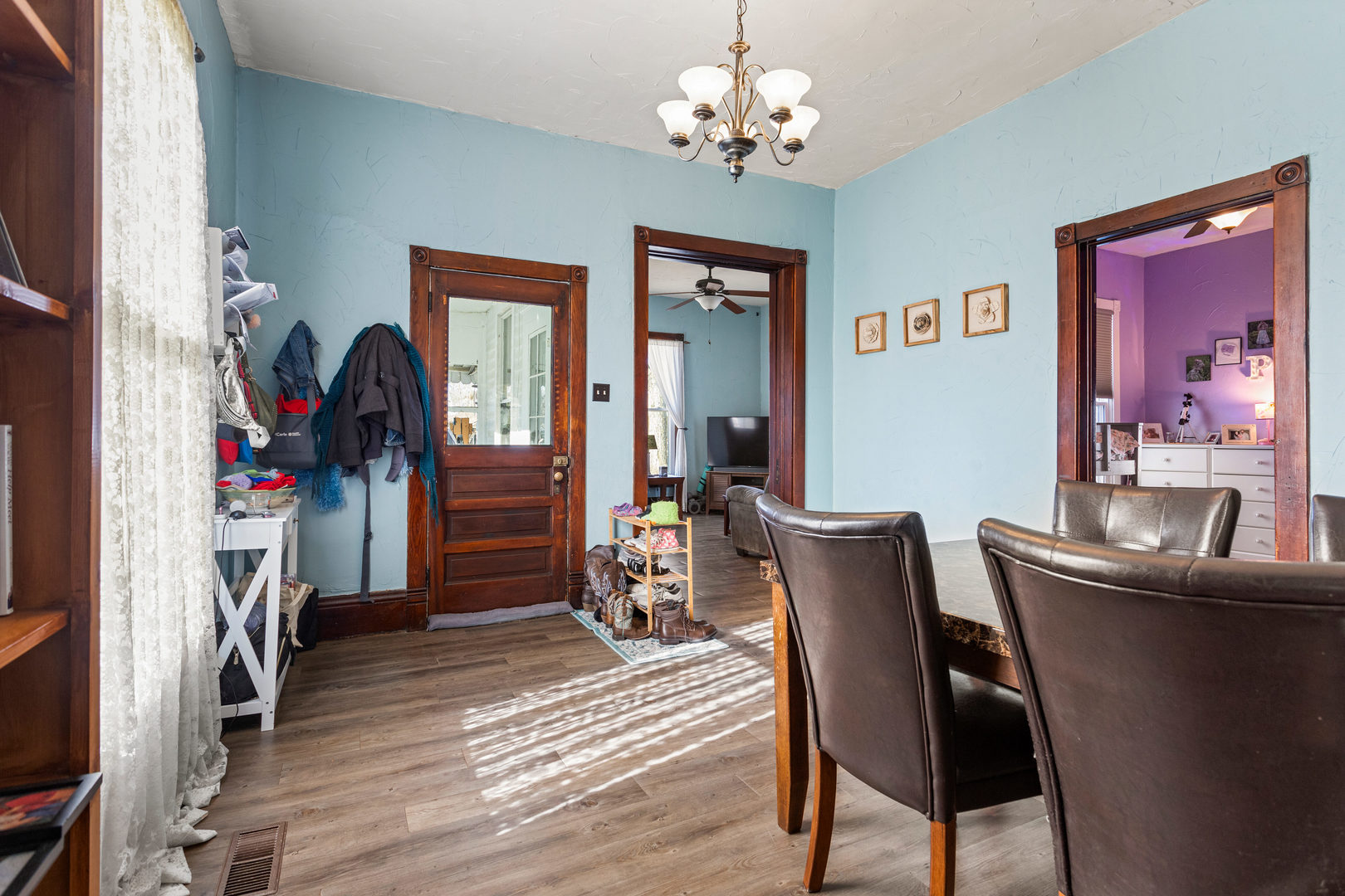 457 South Independence Street Monticello, IL 61856 - Photo 6 of 33 a view of a dining room with furniture wooden floor and a chandelier