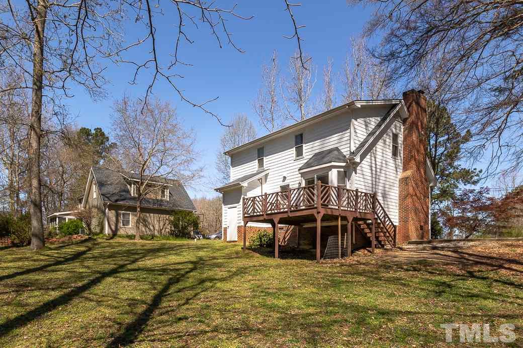 1605 Pagan Road Raleigh, NC 27603 - Photo 23 of 23 a view of a house with a yard