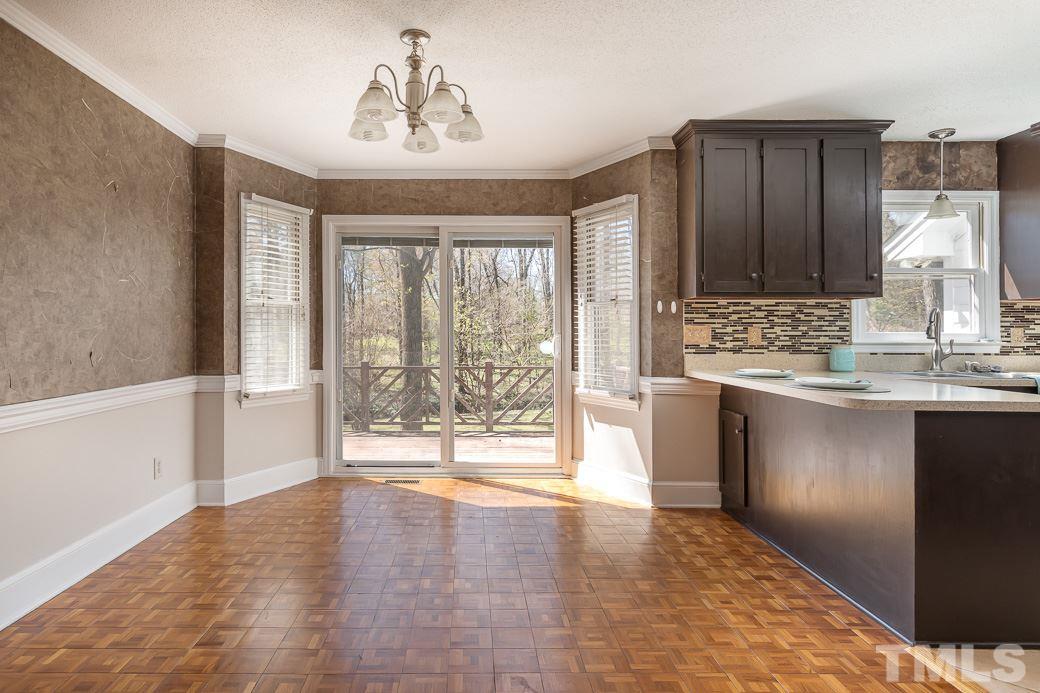 1605 Pagan Road Raleigh, NC 27603 - Photo 7 of 23 a view of a kitchen with a sink and a window
