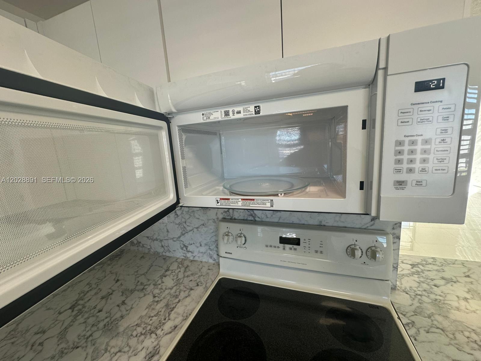 14170 Southwest 84th Street, Unit 402F Miami, FL 33183 - Photo 10 of 36 Microwave
