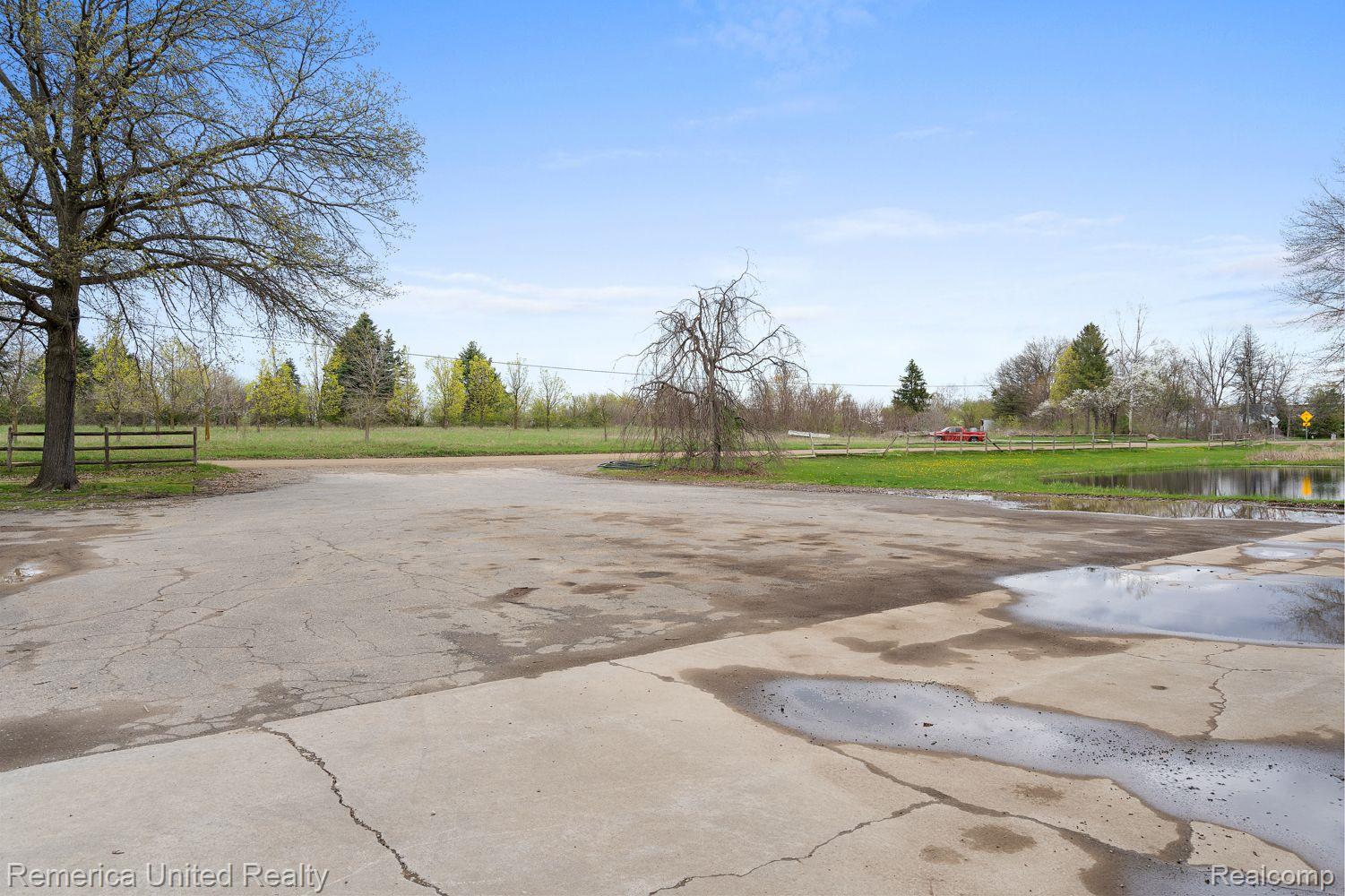 57855 Travis Road New Hudson, MI 48165 - Photo 43 of 55 Parking lot