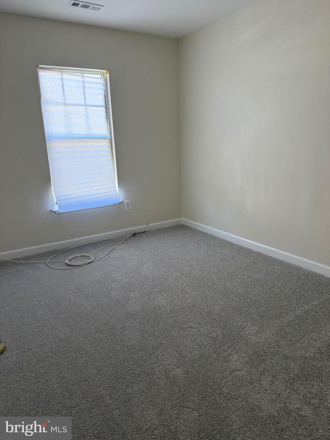 4118 Peppertree Lane, Unit 4118 Silver Spring, MD 20906 - Photo 21 of 30 an empty room with windows