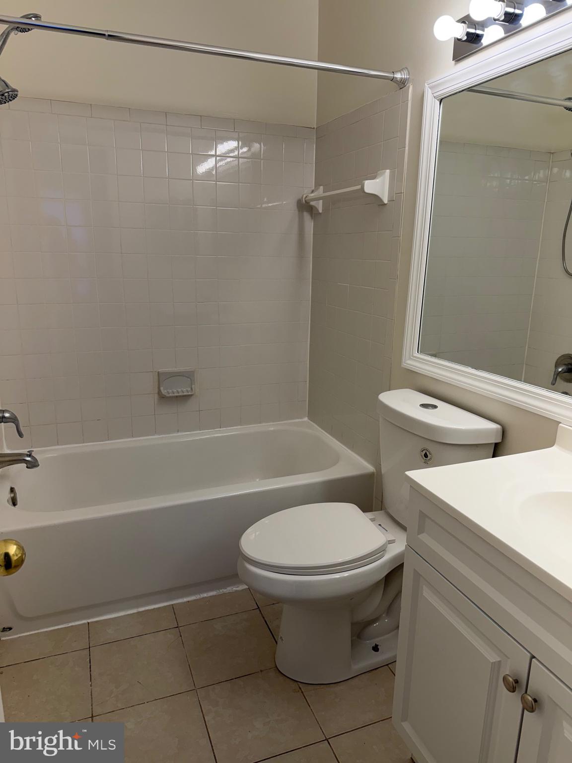 4118 Peppertree Lane, Unit 4118 Silver Spring, MD 20906 - Photo 30 of 30 a bathroom with a toilet and a shower