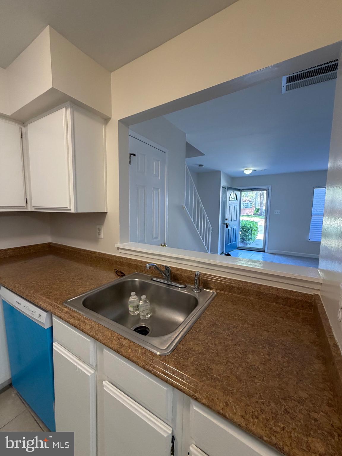 4118 Peppertree Lane, Unit 4118 Silver Spring, MD 20906 - Photo 6 of 30 a kitchen with a sink and cabinets