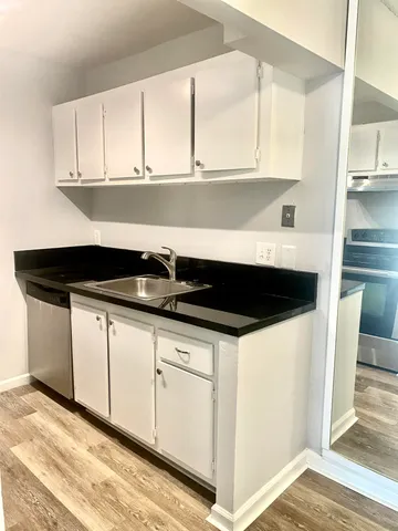 a close view of a cabinets and window