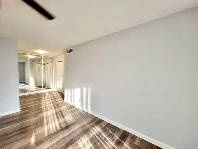 a view of an empty room and window