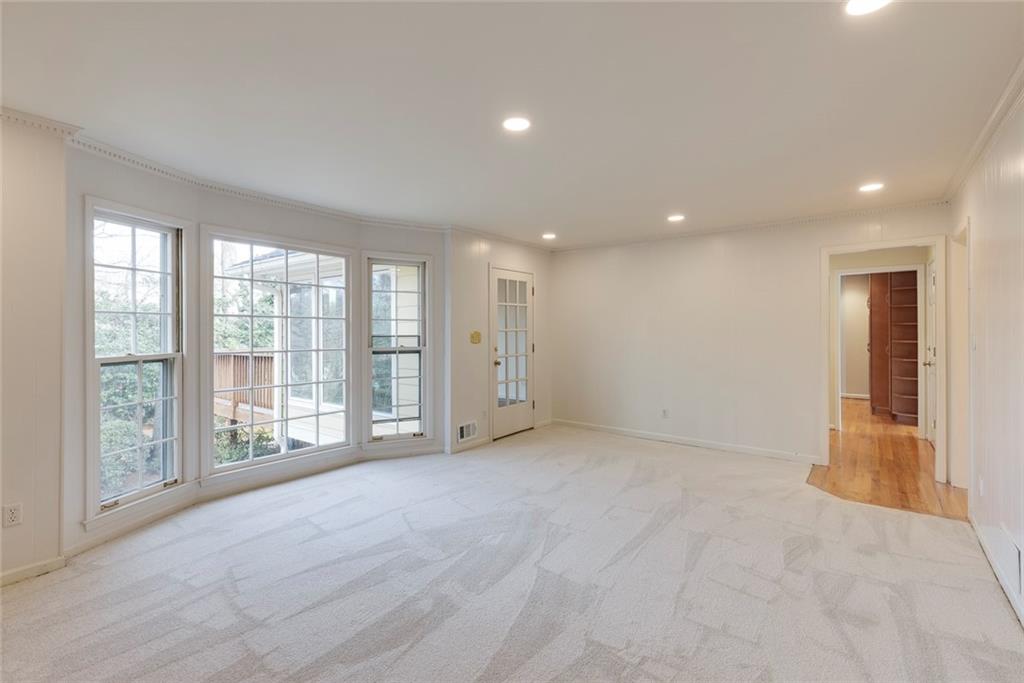 1416 Vernon Ridge Close Atlanta, GA 30338 - Photo 13 of 59 a view of an empty room with a window