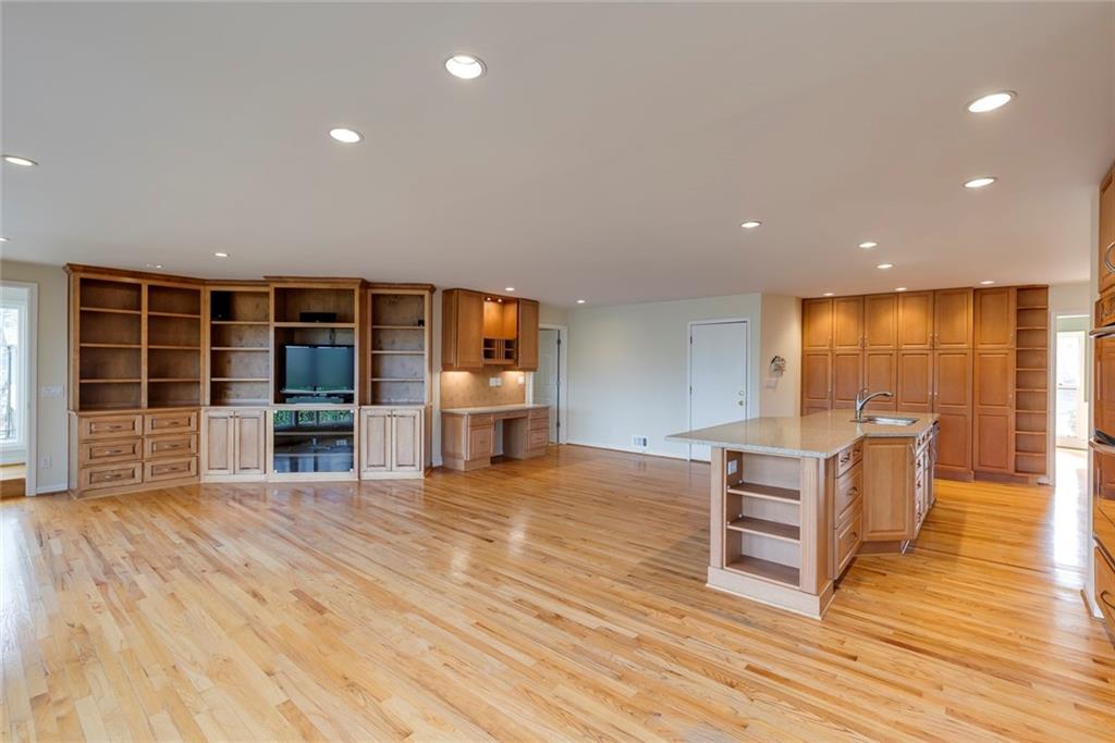 1416 Vernon Ridge Close Atlanta, GA 30338 - Photo 20 of 59 a view of kitchen with wooden floor and seating space