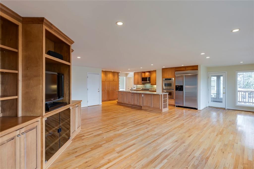 1416 Vernon Ridge Close Atlanta, GA 30338 - Photo 21 of 59 a view of a kitchen with furniture and wooden floor
