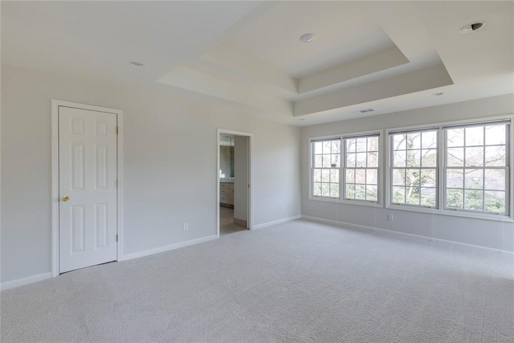 1416 Vernon Ridge Close Atlanta, GA 30338 - Photo 30 of 59 a view of an empty room with a window