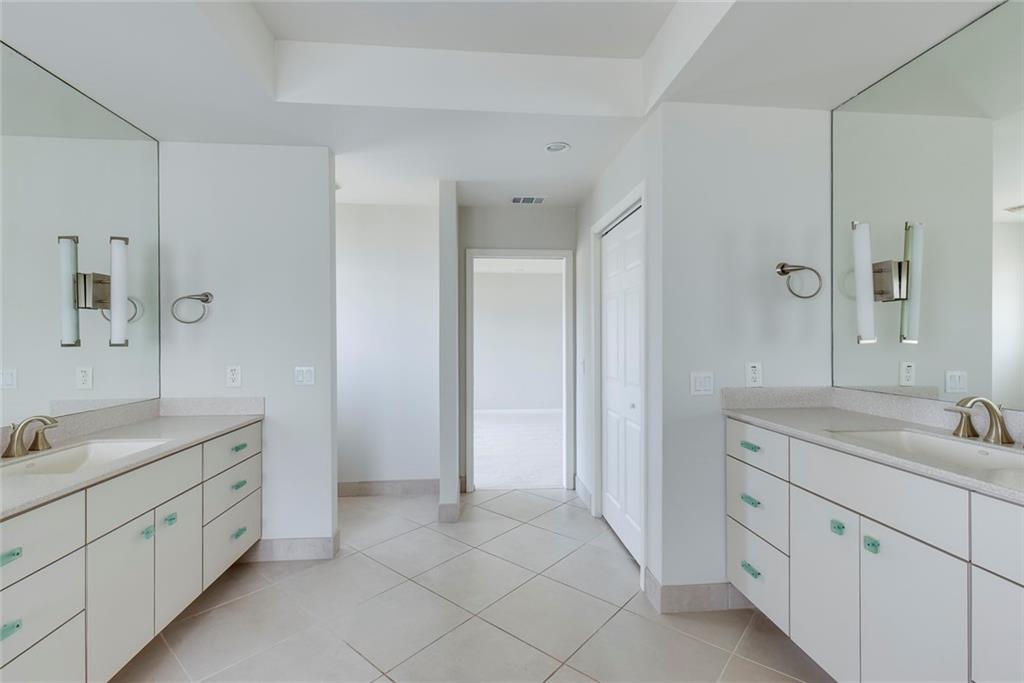 1416 Vernon Ridge Close Atlanta, GA 30338 - Photo 34 of 59 a spacious bathroom with a double vanity sink mirror and double