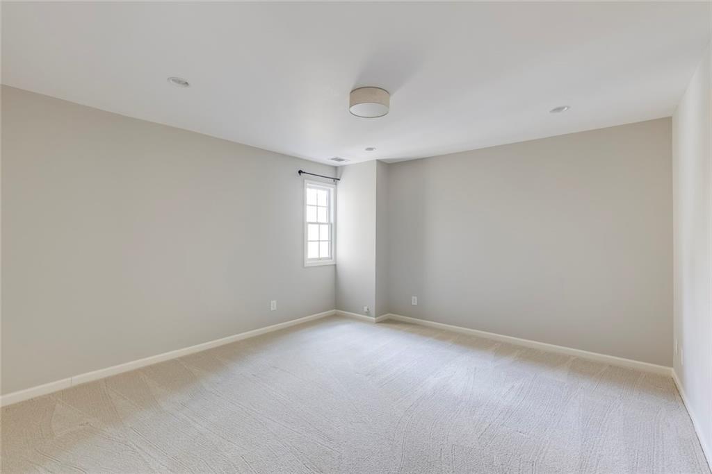 1416 Vernon Ridge Close Atlanta, GA 30338 - Photo 36 of 59 a view of an empty room with a window