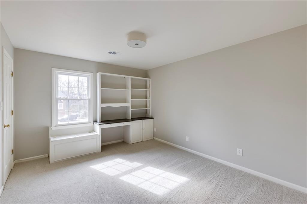 1416 Vernon Ridge Close Atlanta, GA 30338 - Photo 38 of 59 a view of room with window and cabinet