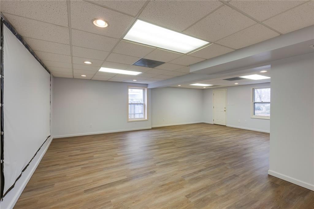 1416 Vernon Ridge Close Atlanta, GA 30338 - Photo 42 of 59 an empty room with wooden floor and windows