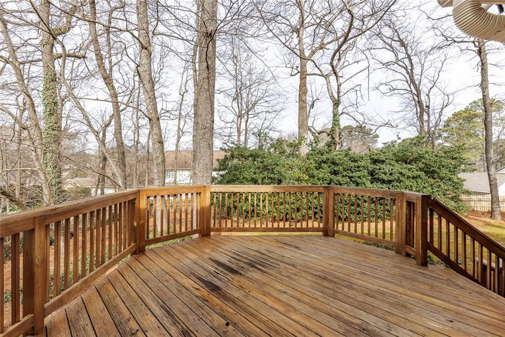 1416 Vernon Ridge Close Atlanta, GA 30338 - Photo 50 of 59 a view of balcony with wooden floor and fence