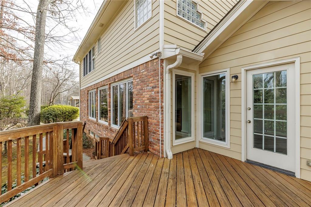 1416 Vernon Ridge Close Atlanta, GA 30338 - Photo 51 of 59 a view of a house with a large window and wooden floor