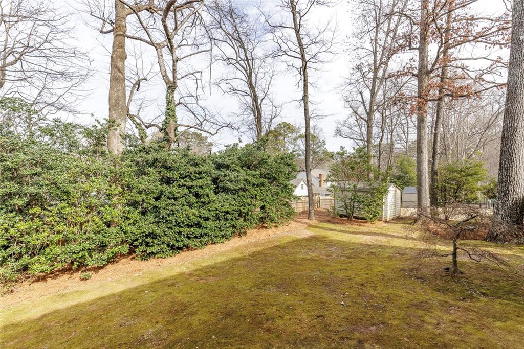 1416 Vernon Ridge Close Atlanta, GA 30338 - Photo 52 of 59 a view of a yard with large trees