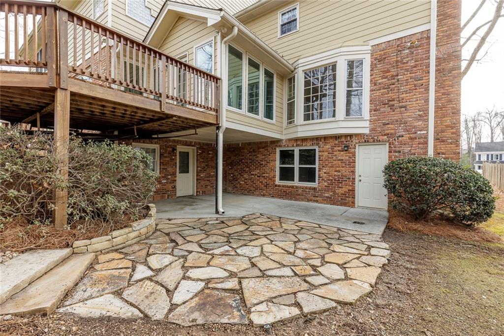 1416 Vernon Ridge Close Atlanta, GA 30338 - Photo 57 of 59 a view of a house with wooden fence
