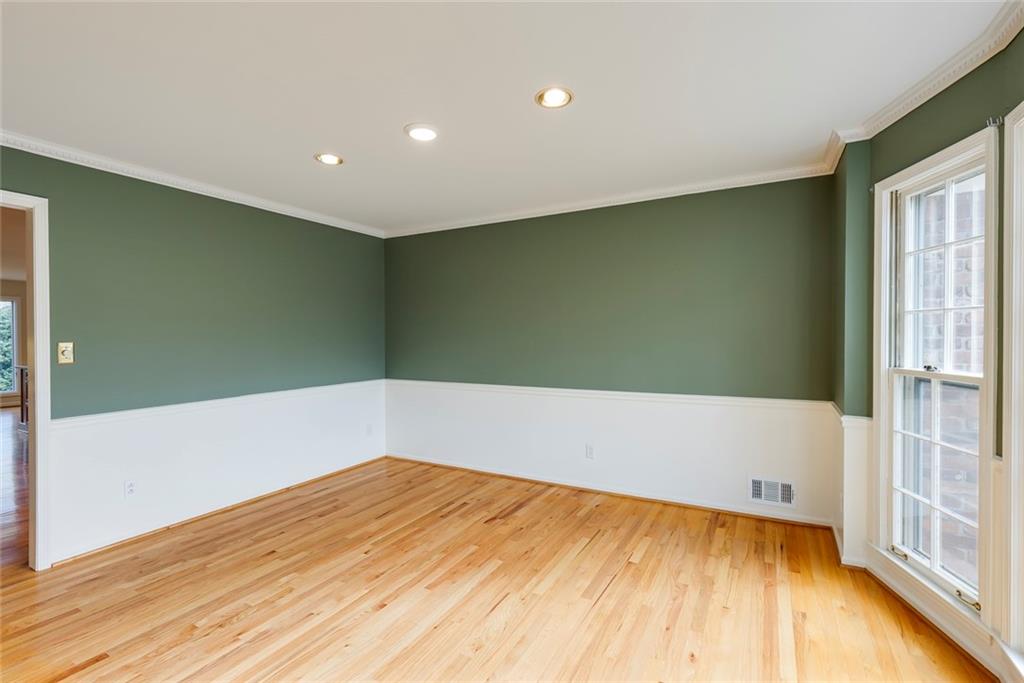1416 Vernon Ridge Close Atlanta, GA 30338 - Photo 8 of 59 a view of an empty room with wooden floor