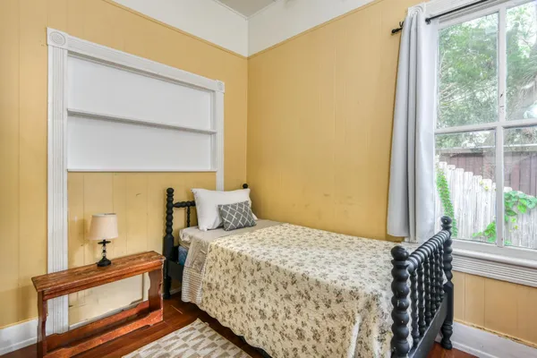 a bedroom with a bed and a cabinets