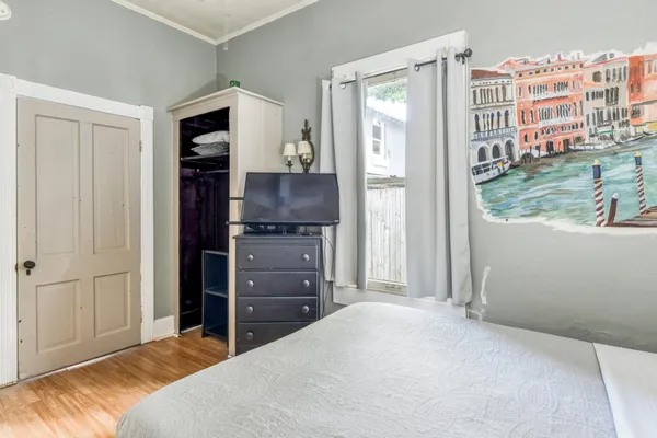 a bathroom with a sink a toilet and shower curtain