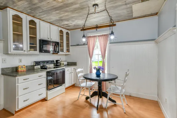 a house with flowers in front of it