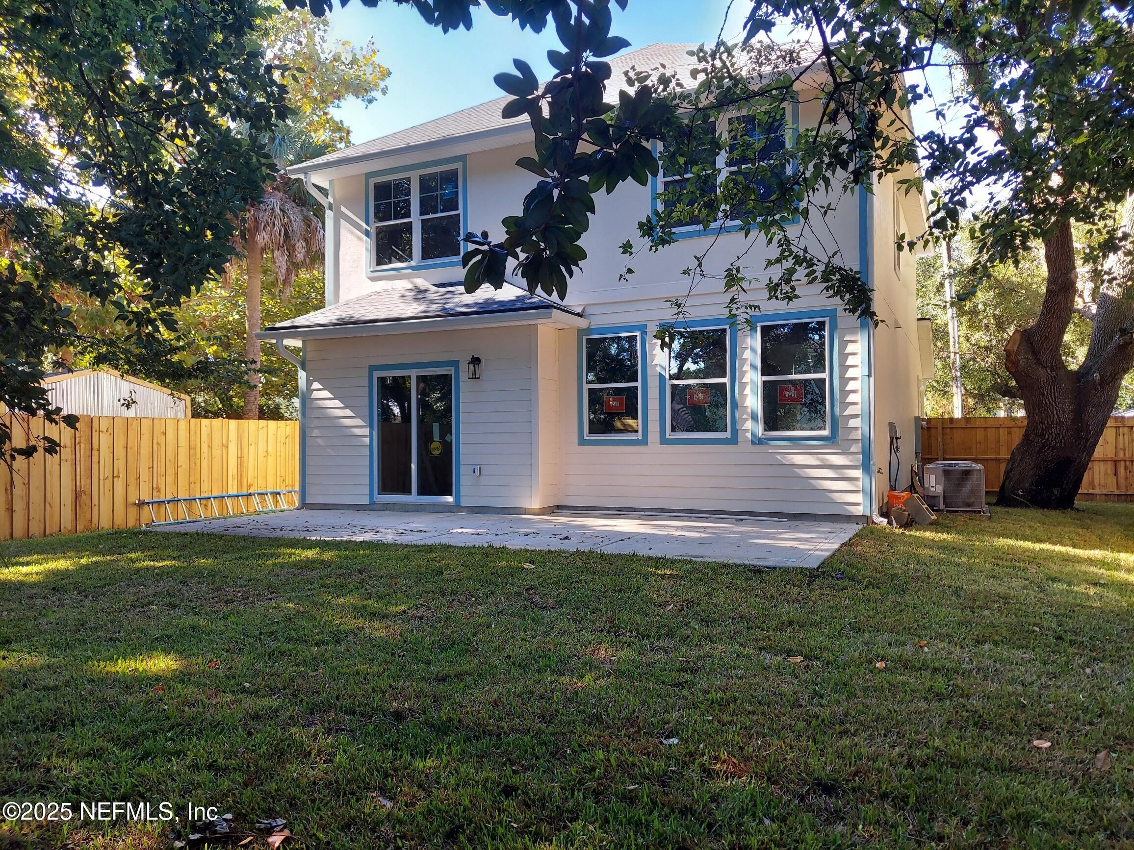 1337 Roxie Street Atlantic Beach, FL 32233 - Photo 6 of 6 a front view of a house with a yard