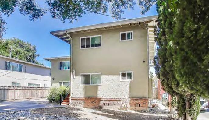 2129 Randolph Drive San Jose, CA 95128 - Photo 6 of 8 a front view of a house with a yard and garage