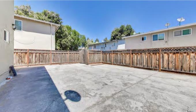 2129 Randolph Drive San Jose, CA 95128 - Photo 7 of 8 a view of a backyard with wooden fence