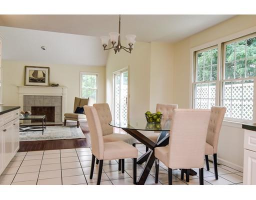 9 Hemlock Lane Framingham, MA 01701 - Photo 14 of 25 a view of a livingroom with furniture and a fireplace