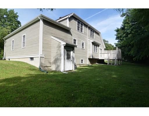 9 Hemlock Lane Framingham, MA 01701 - Photo 23 of 25 a view of a house with a yard