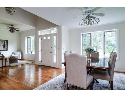 9 Hemlock Lane Framingham, MA 01701 - Photo 4 of 25 a view of a dining room with furniture window and wooden floor