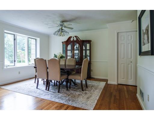 9 Hemlock Lane Framingham, MA 01701 - Photo 6 of 25 a view of a dining room with furniture and wooden floor