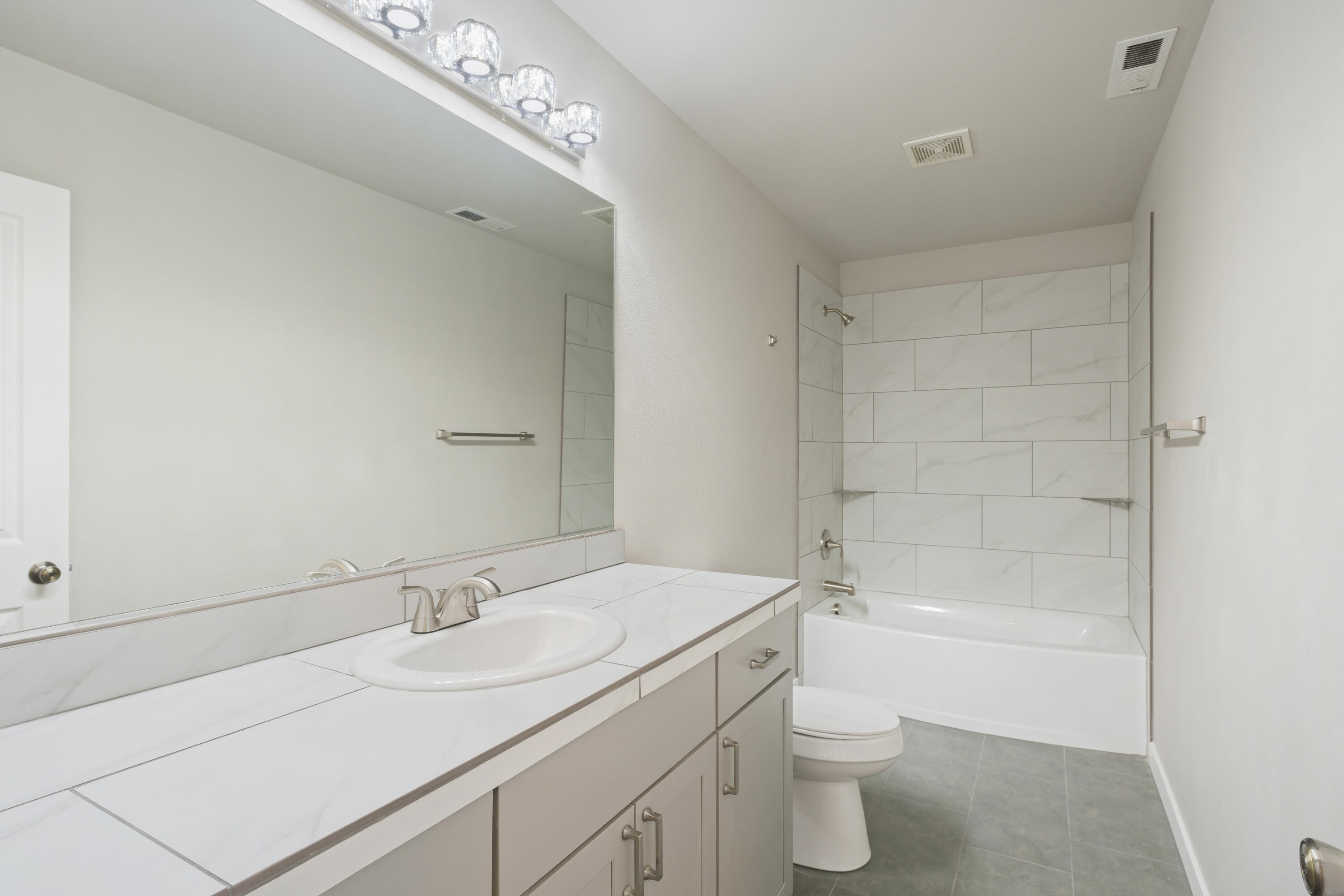 21189 Ritz Place Bend, OR 97702 - Photo 20 of 37 a bathroom with a sink a toilet and shower