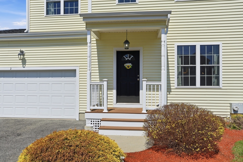 2 Dino Way, Unit 52 Milford, MA 01757 - Photo 3 of 41 a front view of a house