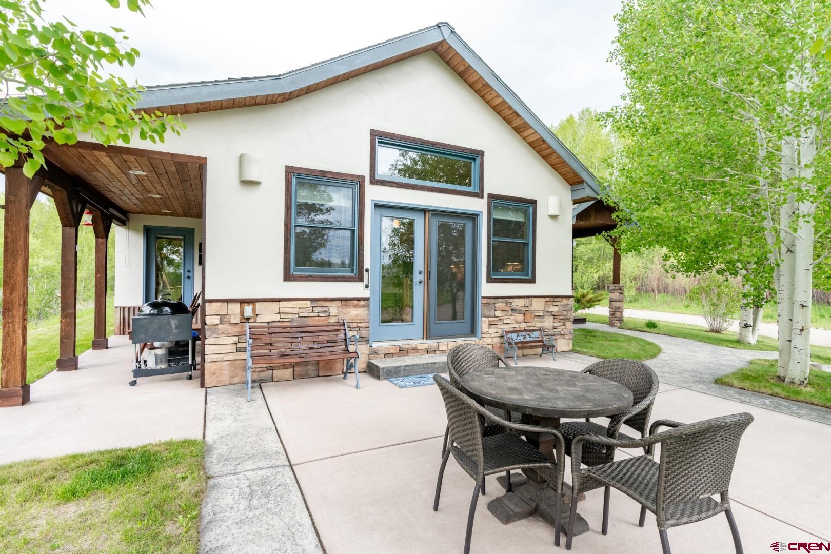 305 Roper Lane Almont, CO 81210 - Photo 14 of 35 a view of a house with backyard and sitting area