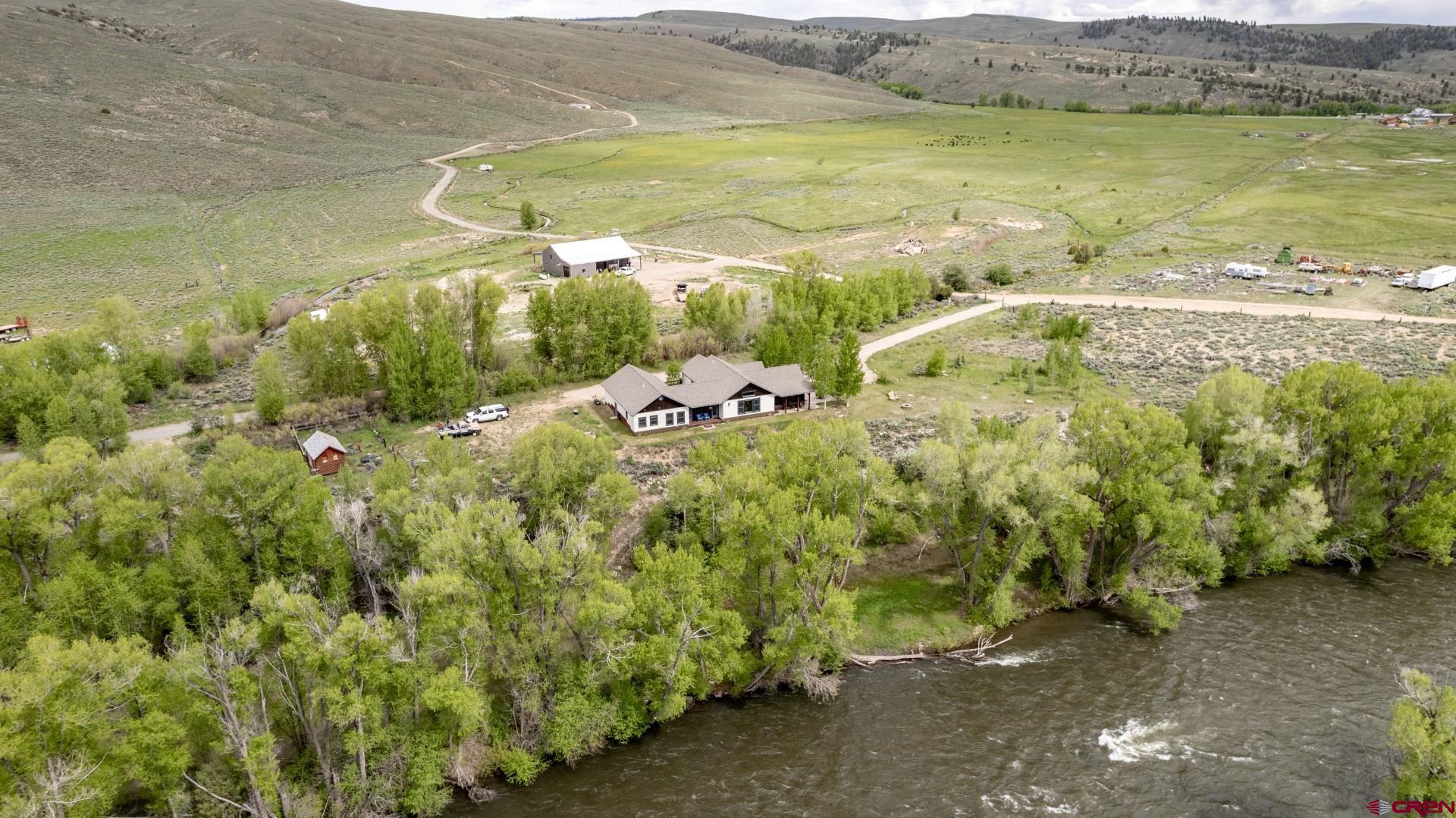 305 Roper Lane Almont, CO 81210 - Photo 5 of 35 a view of a field with an ocean