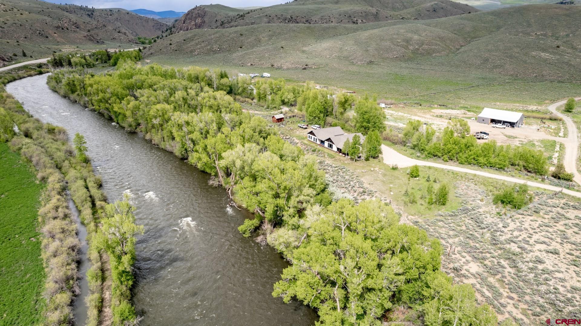 305 Roper Lane Almont, CO 81210 - Photo 6 of 35 a view of a garden with a building