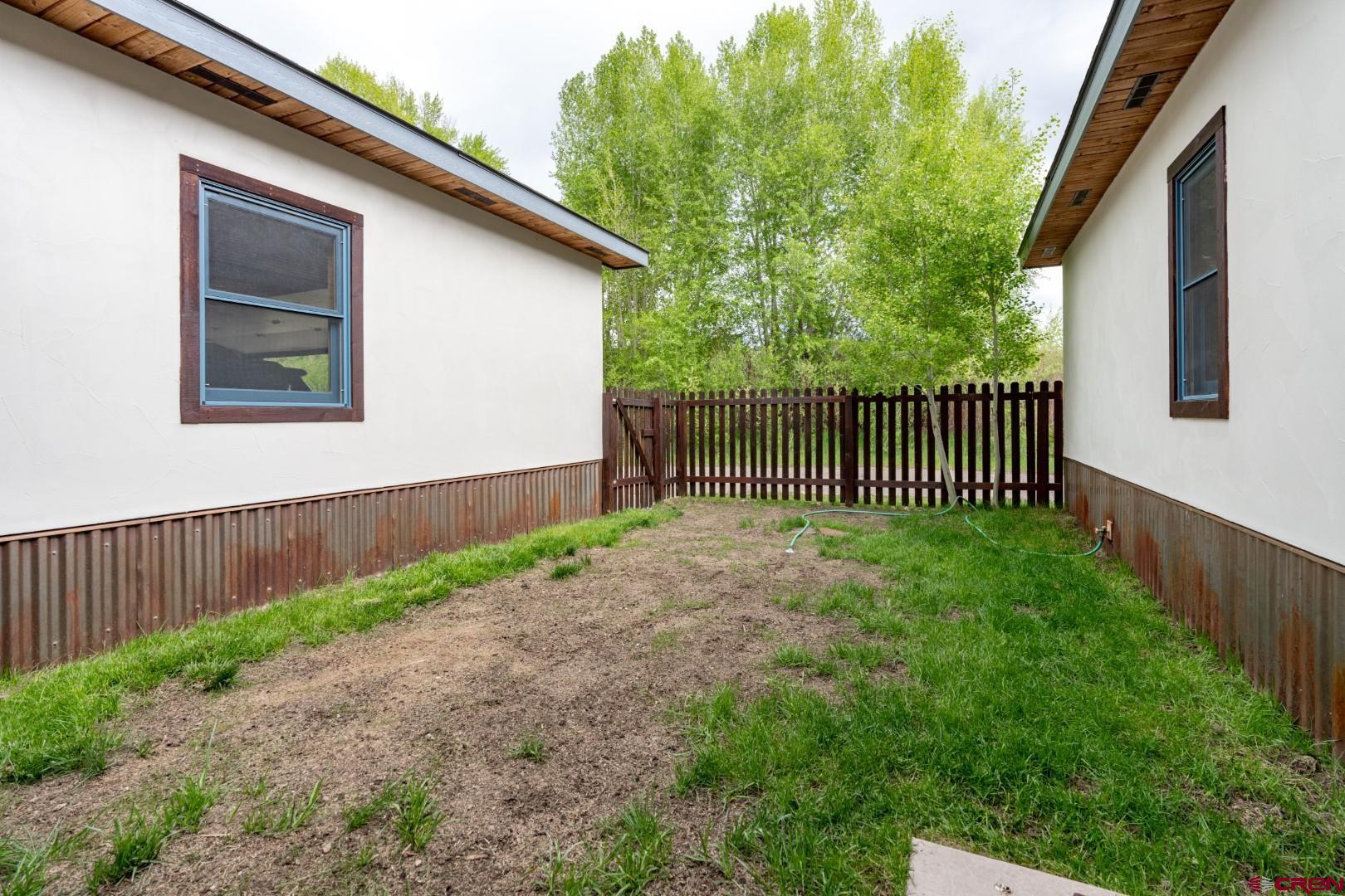 305 Roper Lane Almont, CO 81210 - Photo 8 of 35 a view of a backyard with a garden