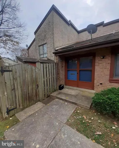 an empty room with wooden floor