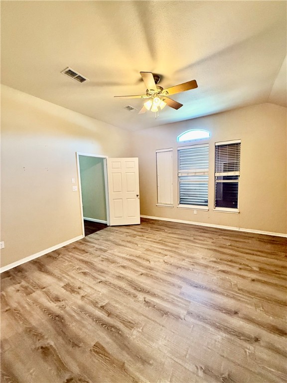 7814 Regal Street Corpus Christi, TX 78413 - Photo 16 of 35 a view of a room with wooden floor and ceiling fan