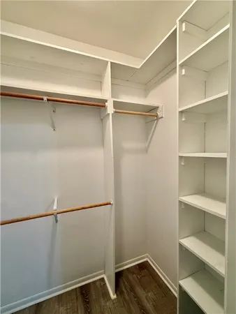 a view of an empty walk in closet