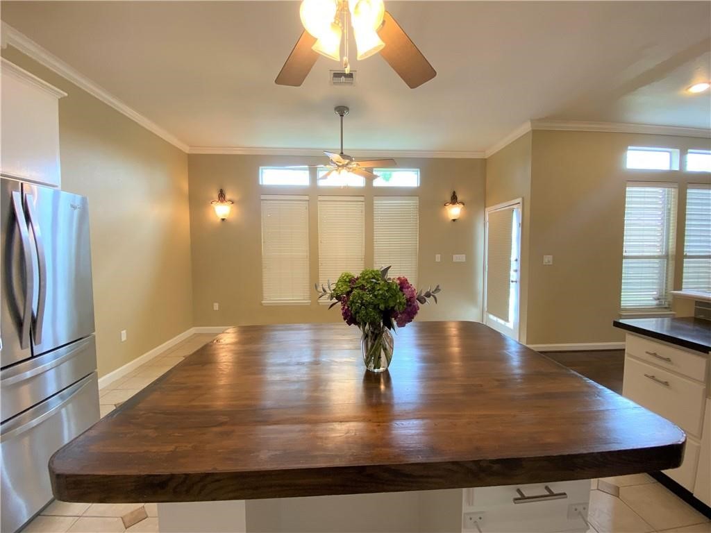 7814 Regal Street Corpus Christi, TX 78413 - Photo 7 of 35 a view of kitchen with refrigerator and window