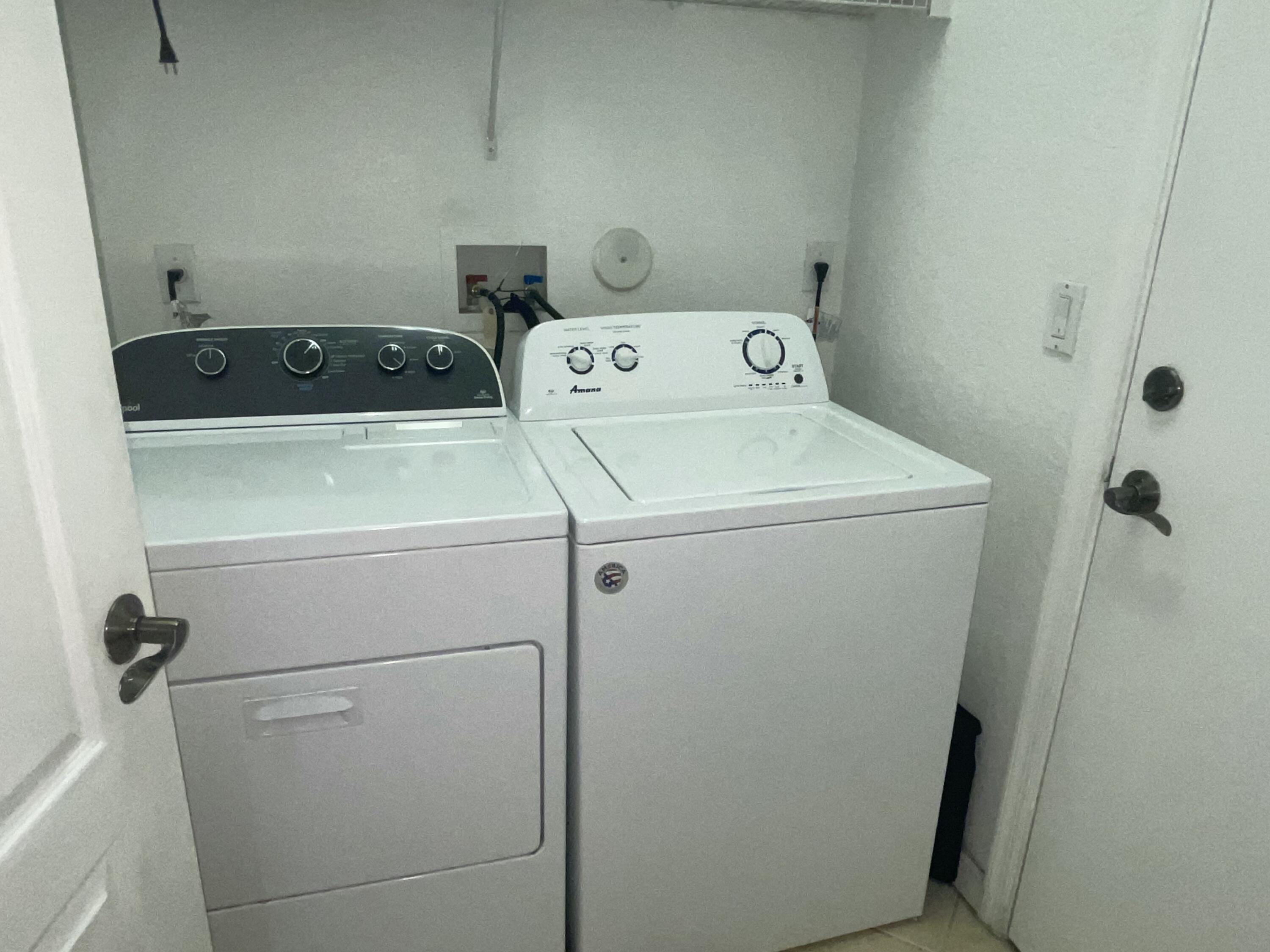 1092 Florence Road Lantana, FL 33462 - Photo 15 of 15 a utility room with dryer and washer